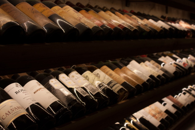 Rows of premium wine bottles on a wine rack